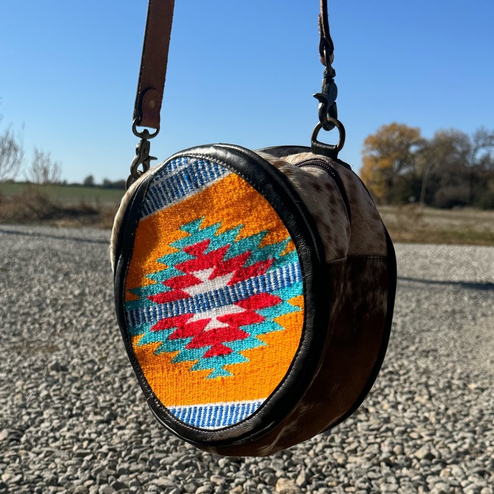 Western Linen Cowhide 10” circle Aztec & tooled purse